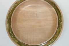 A shallow plate made from Sycamore, it measured 160 mm in diameter by 30 mm deep, Green, Gold and White Pebeo paint was used for the rim.